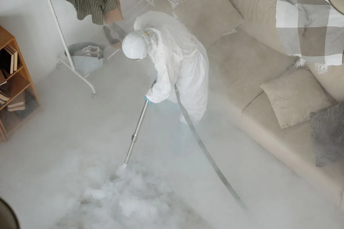 Biohazard cleanup technician in protective equipment, South Sarasota, FL